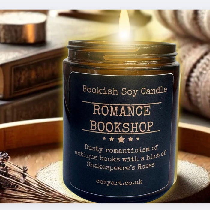 Cosy Art London Romance Bookshop Candle in a cosy environment with books and blanket